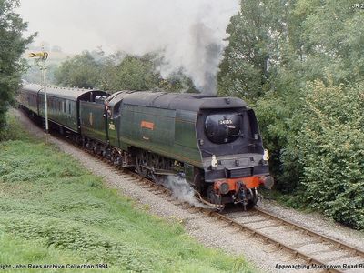 Oct 2nd 1994. 34105 Swanage seen approaching Maesdown Rd with a train on route to Cranmore.